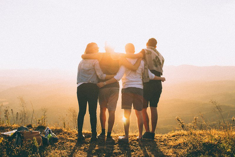 Friends laughing together outdoors